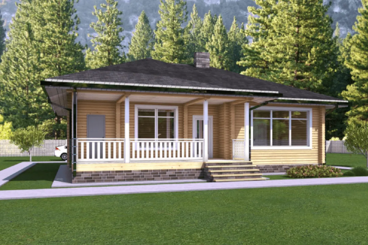 A modern wooden house with a covered porch and large windows, nestled among green trees.