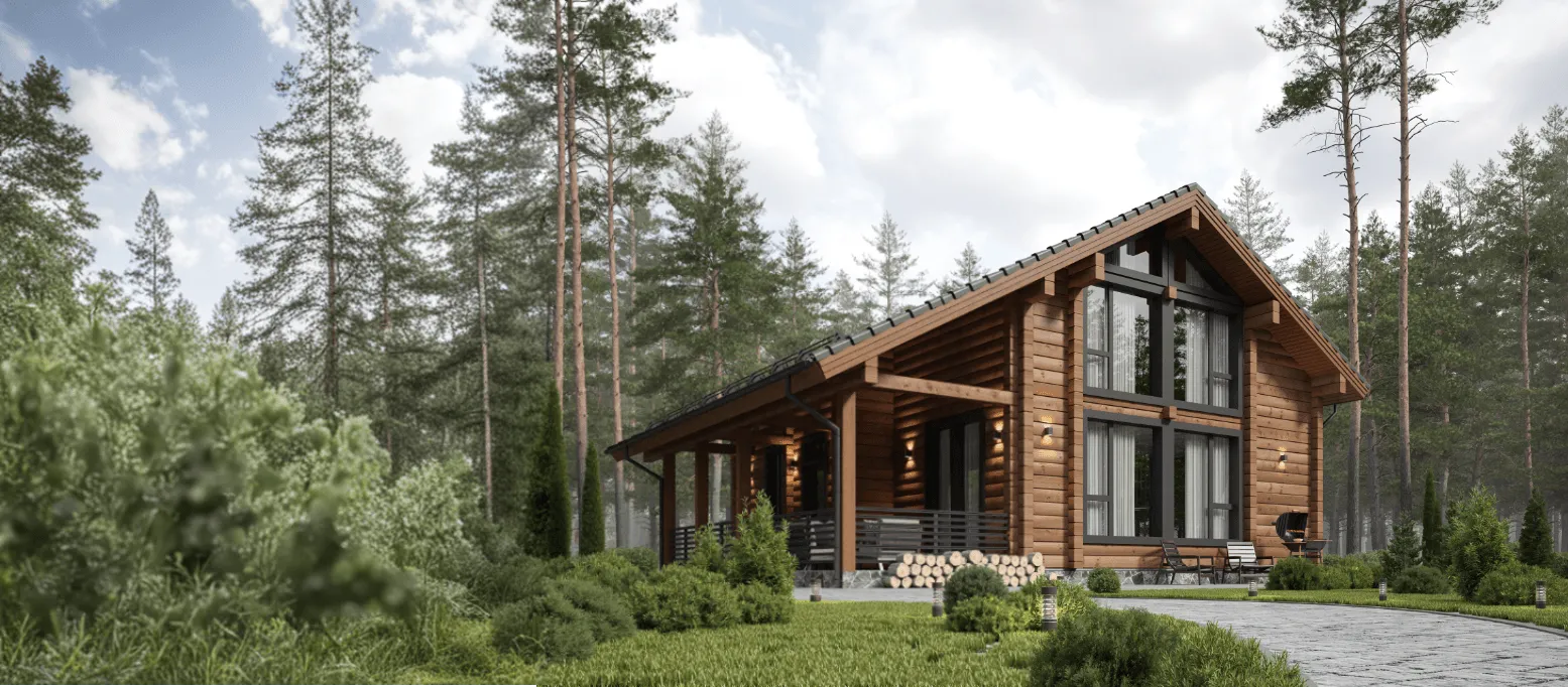Modern wooden cabin with large windows nestled among tall pine trees and green foliage.